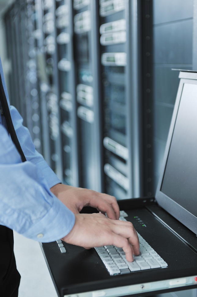 young it engeneer in datacenter server room